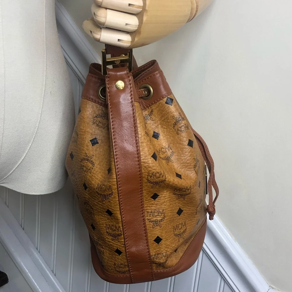 MCM Visetos Cognac Leather Monogram Bucket Drawstring Crossbody Bag EUC